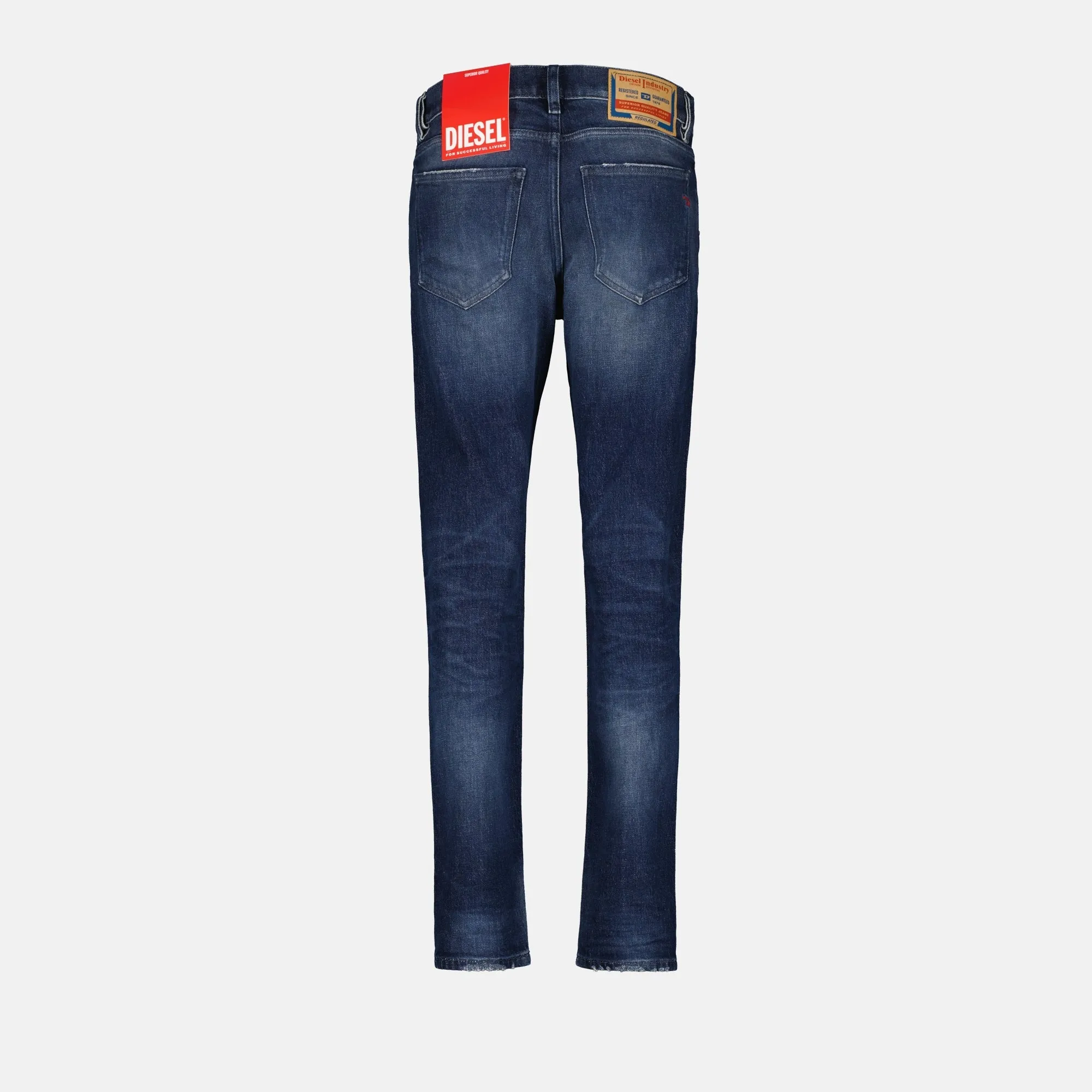 Slim-fit distressed denim jeans