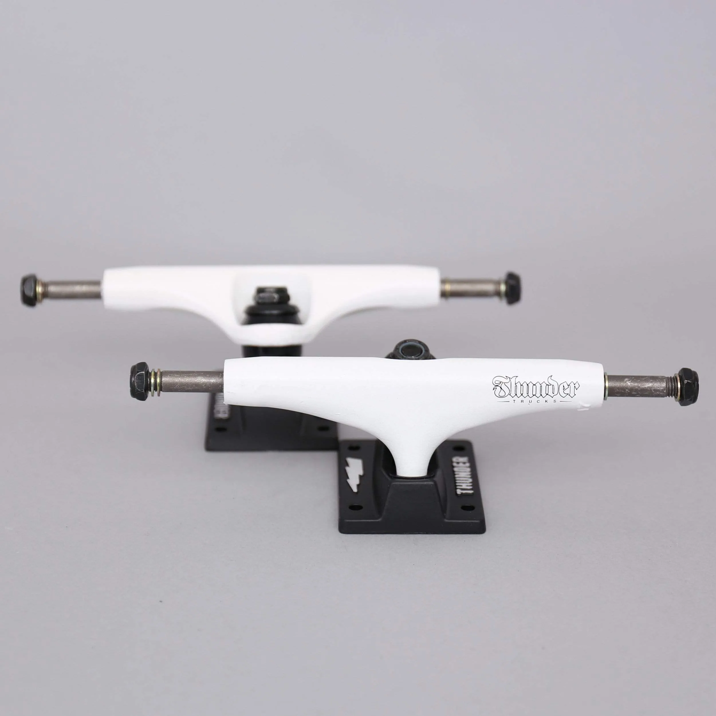 Thunder 147 Onyx Team Skateboard Trucks White / Black (Pair)